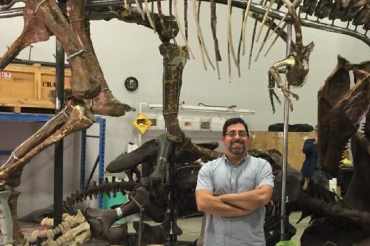 matthew carrano with dinosaur skeleton