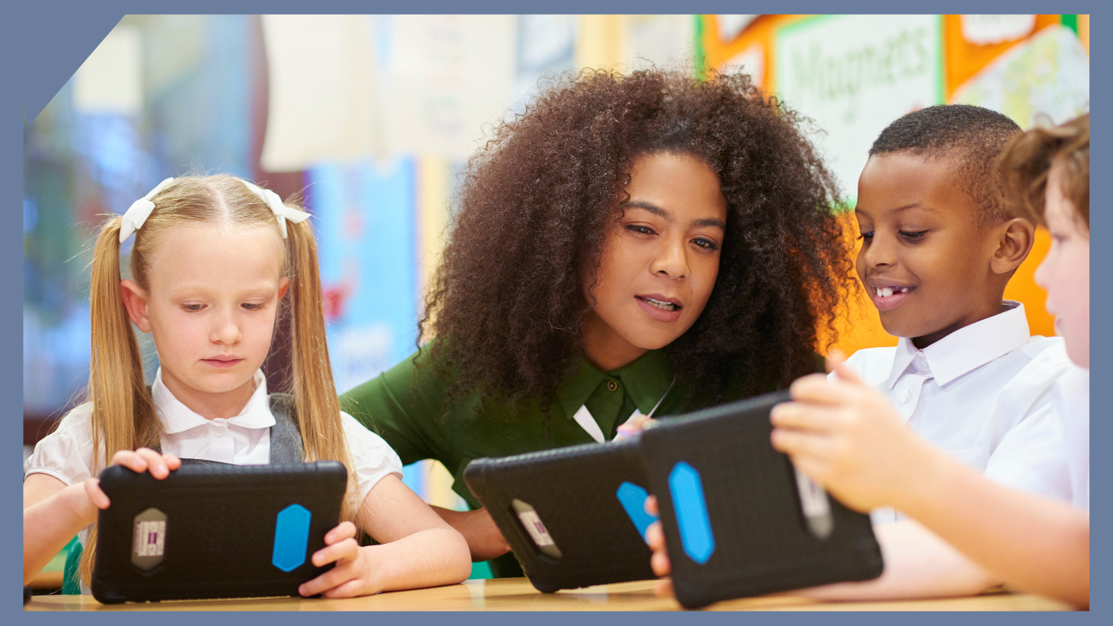 Black female teacher with two young students