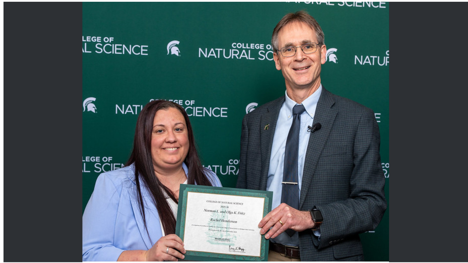 Rachel Henderson receiving award from Dean Hegg