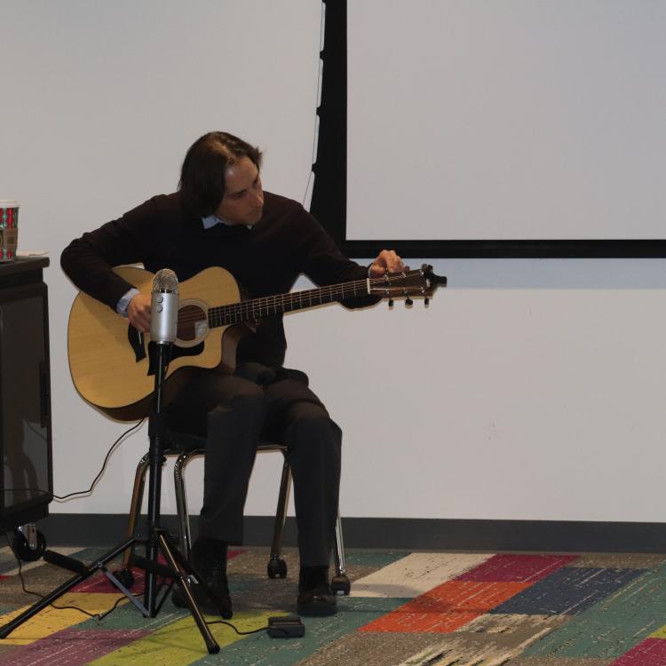 Stephen playing guitar