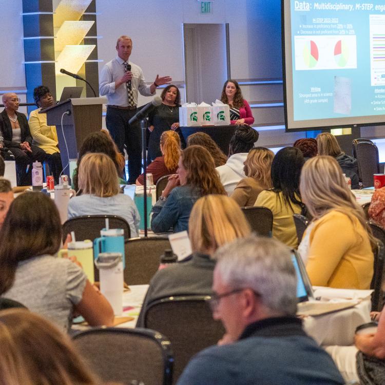 Panelists with gift bags