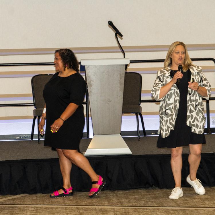 2 female panelists speaking