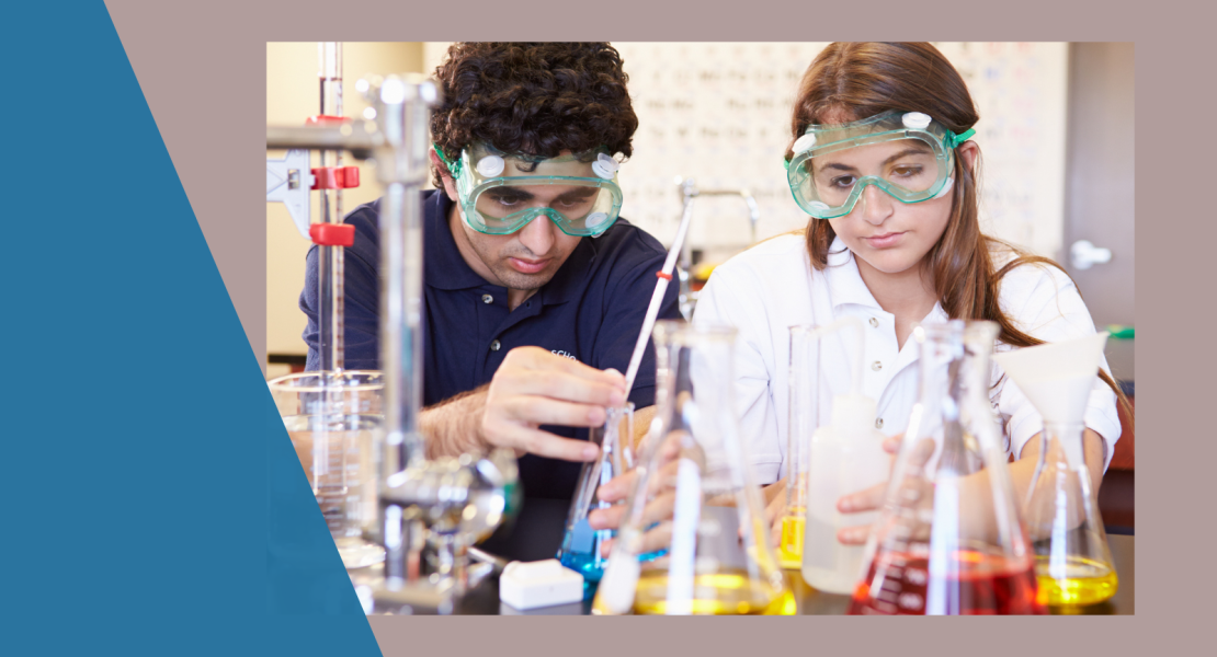 Male and female students working with test tubes