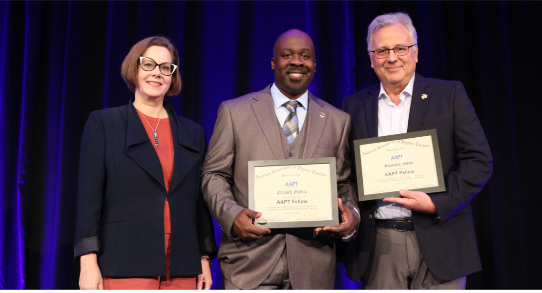 Clausell Mathis reciving AAPT award and two others