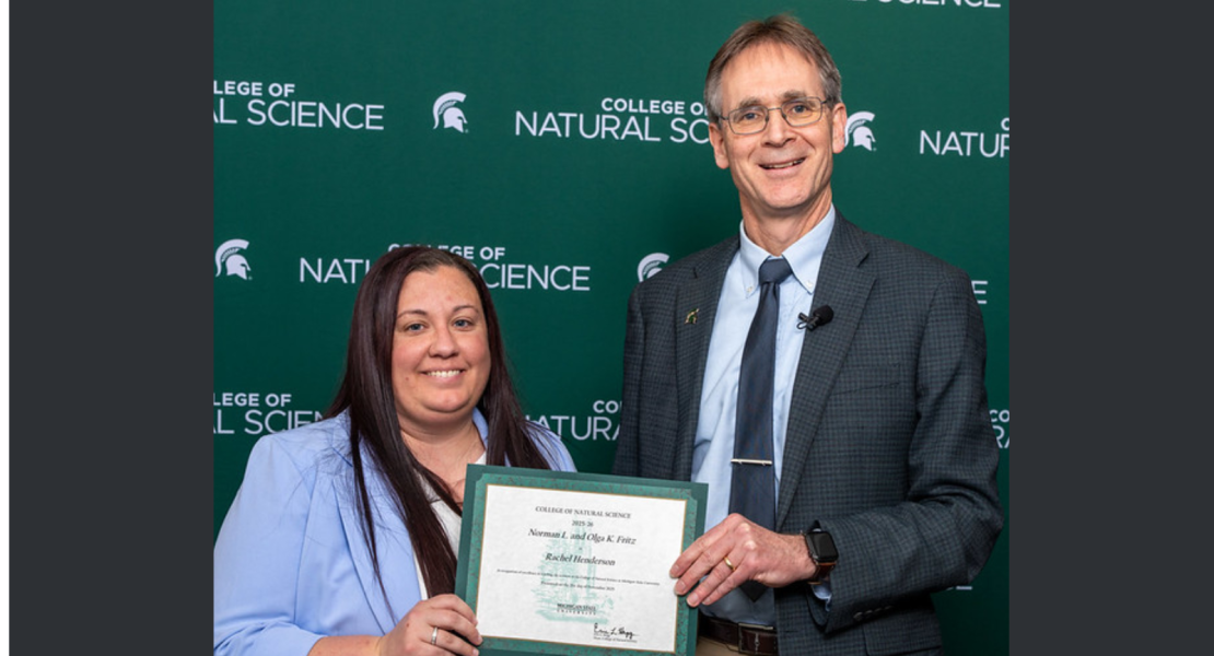 Rachel Henderson receiving award from Dean Hegg