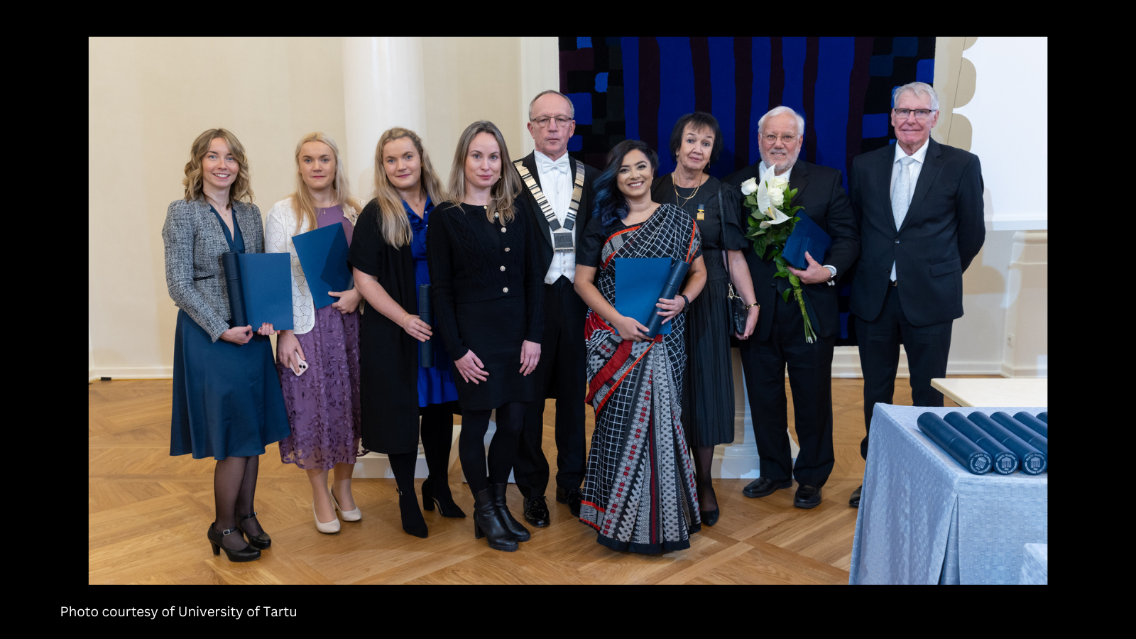 Photo of award winners at University of Tartu event, including Joe Krajcik